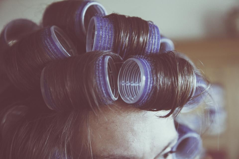 Close-up of hair set in rollers